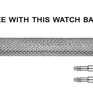 May include: A silver watch band tool with a textured handle and two silver spring bars. INCLUDED FREE WITH THIS WATCH BAND PURCHASE.