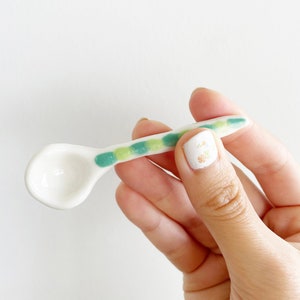 Little porcelain ceramic salt sugar spoon, white with green and lime glaze