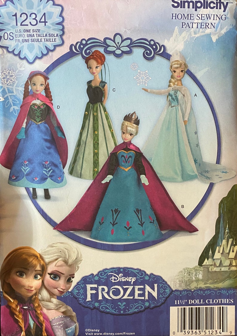 May include: A Simplicity sewing pattern for 11 1/2 inch doll clothes featuring Disney's Frozen characters. The pattern includes four different outfits: a blue dress with a red cape, a green dress with gold accents, a blue dress with a purple cape, and a light blue dress with a white cape. The pattern is labeled with the Disney Frozen logo and the text "11 1/2" Doll Clothes".