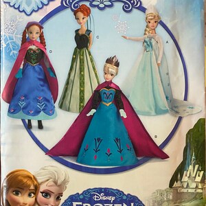 May include: Simplicity sewing pattern S0734 for 11 1/2 inch dolls. The pattern includes four different outfits inspired by the Disney movie Frozen. The outfits include a blue dress with a pink cape, a green dress with a black bodice, a blue dress with a white cape, and a blue dress with a red cape. The pattern also includes a picture of the characters Anna and Elsa from the movie Frozen.