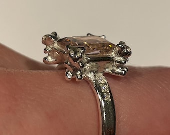 Fine silver ring with pink radiant cut center cubic zirconia stone