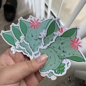 Pegatina de gatito con cactus