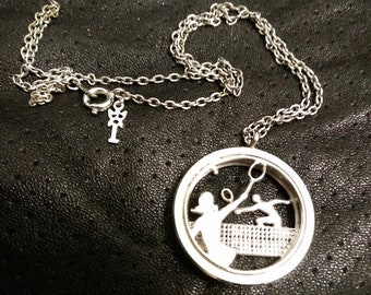 Giftable. Vintage Crown Trifari 3D Tennis Couples Pendant / necklace. 15" chain with Trifari tag.  Estate sale find. #2129