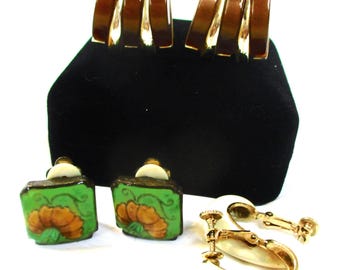Set 3 pr signed clip-back earrings: Karu lucite & goldtone, Napier enameled hoop; "star" encased cloisonne flower. Estate sale finds #2486
