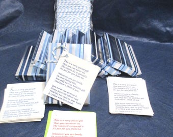 Box of "Love Gift" blue-silver supplies. Wrapped blocks, string, enclosure notes. 1 sample, 7 blocks, 28 enclosure cards to make more. SJ188