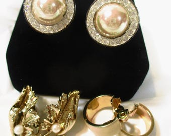 Set 3 pr signed vntg clip-on earrings: Roman & Coro faux pearls, Roman rhinestones, Coro goldtone, Monet enamel hoops. Estate Sale  #2485