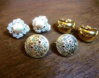 Set 3 pr vntg clip-back earrings, signed: Kramer goldtone- turquoise-ruby discs, Monet goldtone hoop, Y&J rhinestone/pearl. Estate sale 2483