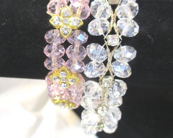 Two double row AB bead bracelets: one pink with golden accents & rhinestones and one clear with rhinestones. Estate sale rescues 2580