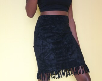 white pleated mini skirt