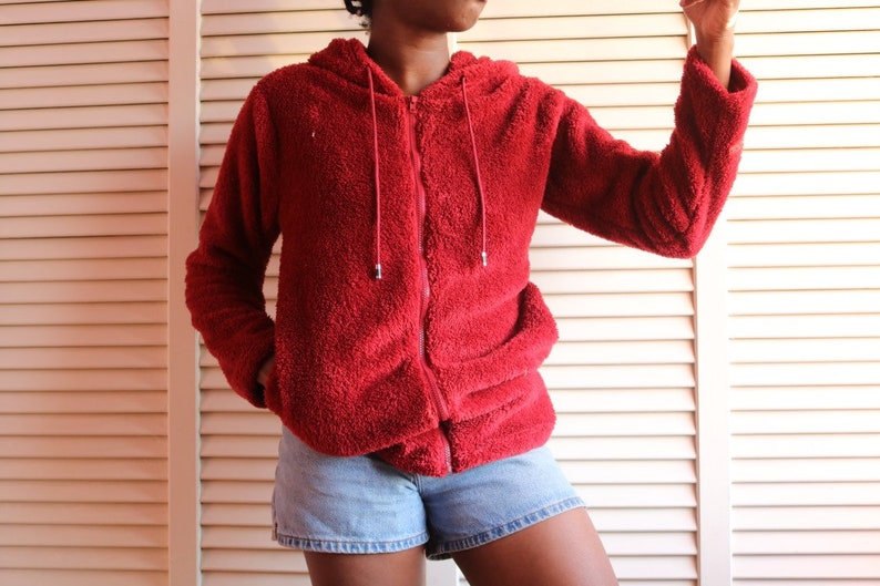 red fuzzy jacket