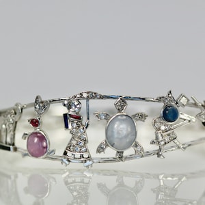 Art Deco Platin Charms am Armband