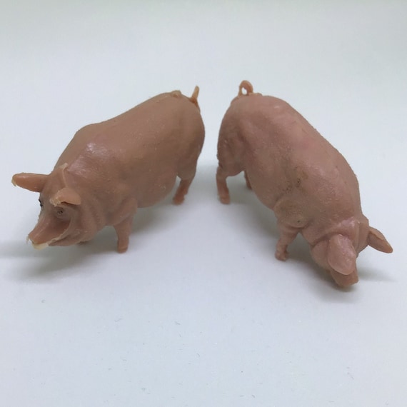 mini plastic pigs