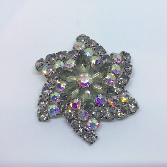 Vintage silver tone brooch with grey rhinestones