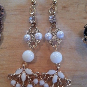 White and gold elegant earrings