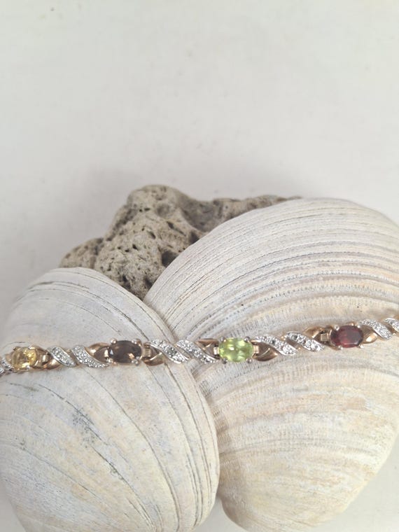 Gold Multi Stone bracelet - image 1