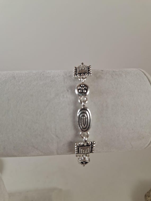 Silver Geometric Shape Bracelet - image 1