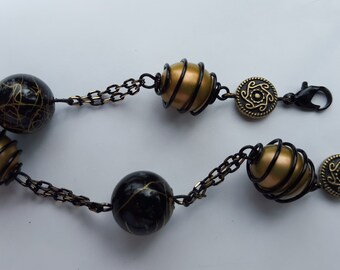 Wire wrapped Black and gold bracelet