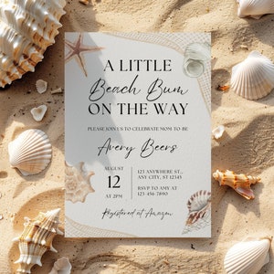 Peut inclure: Une carte blanche avec une invitation à une fête prénatale sur le thème de la plage. La carte présente un motif de coquillage et le texte "A Little Beach Bum On The Way" avec le nom "Avery Beers" et la date "August 12".