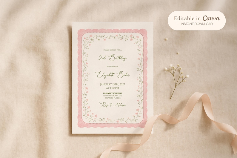 May include: A cream-colored invitation with a pink scalloped border and floral accents. The text reads "2nd Birthday" and includes details for Elizabeth Baker's birthday on January 13th, 2027. A ribbon and flowers are also present.