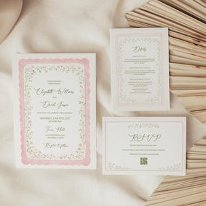 May include: A set of three wedding stationery cards. The invitation card features the names "Elizabeth Williams" and "David Japa" with floral border and pink scalloped edge. The RSVP and details cards are also included.