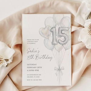 May include: A birthday invitation card with the text "Sadie's 15th Birthday." The design includes a cluster of silver and clear balloons, with a number "15" balloon. The card also displays the date, time, and location of the party.