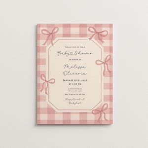 May include: A baby shower invitation with a pink gingham pattern background and decorative pink bows. The invitation features the text "Baby Shower" and details for Melissa Oliveria's baby shower, including the date, time, and location.