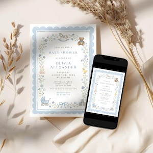 May include: A baby shower invitation with a light blue scalloped border and floral accents. The invitation includes the text "Join us for a Baby Shower in Honor of Olivia Alexander" and event details. A smartphone displays the same invitation.