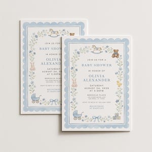 May include: Two baby shower invitations with a light blue scalloped border. The invitations feature floral and toy illustrations, including a rocking horse, teddy bear, and baby carriage. Text reads "Baby Shower" and the name "Olivia Alexander".