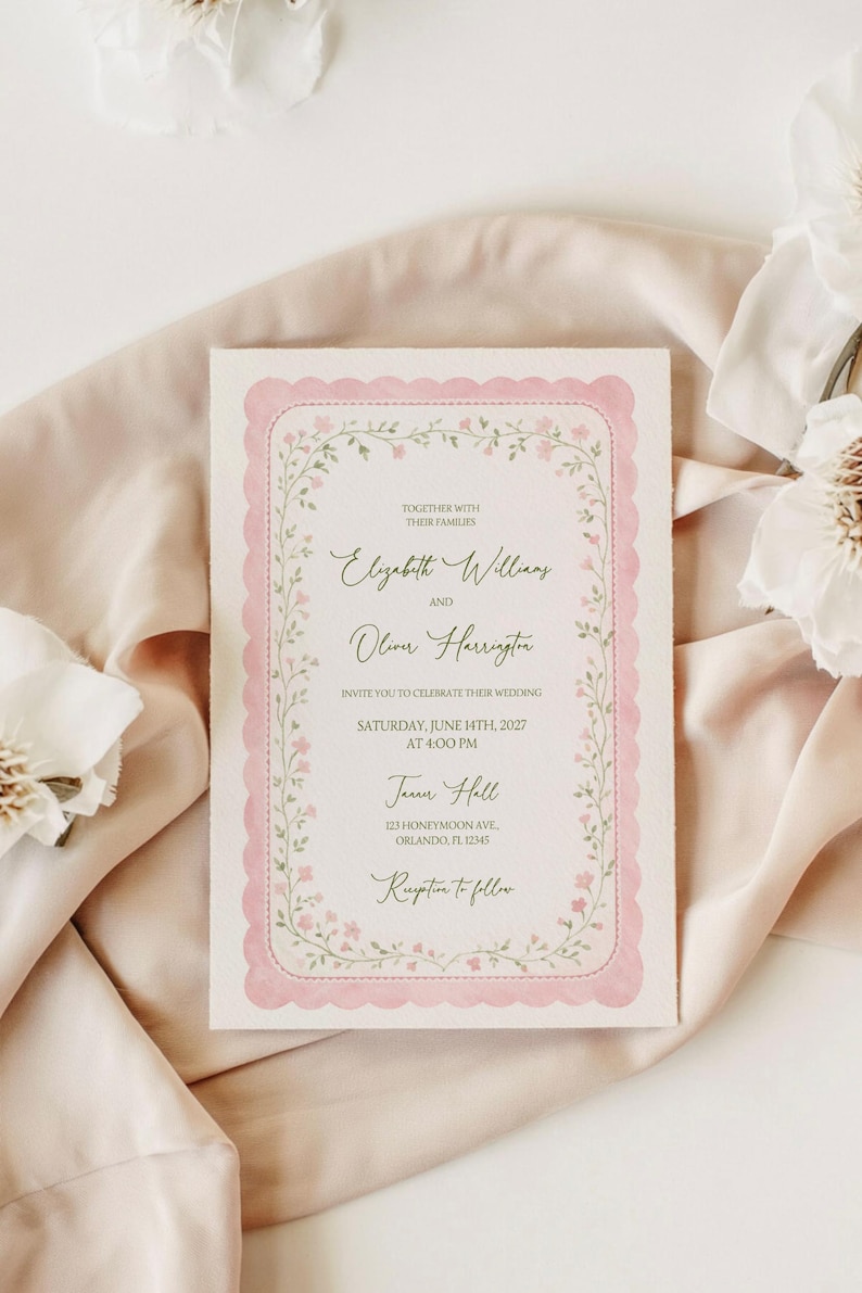 May include: A wedding invitation with a pink scalloped border and floral accents. The text reads "Elizabeth Williams and Oliver Harrington invite you to celebrate their wedding" on June 14th, 2027, at 4:00 PM, at Jane Hall in Orlando, FL.