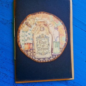 May include: A greeting card with a vintage illustration of a potion bottle labelled "Elixir of Dreams". The card has a dark blue background and a brown border, with other apothecary-themed elements. The card is designed in a vintage style.