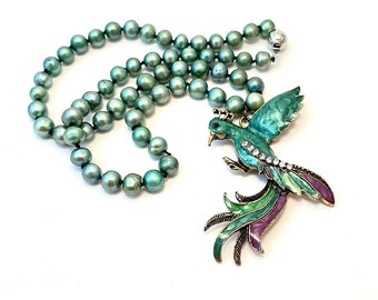 Necklace Pendant.  The Cloisonné Bird of Paradise pendant.  This beautiful pendant hangs on greenish cultured pearls. Necklace