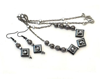 Necklace and Earrings Jewelry Set. Timeless Necklace and Earrings. Always in style Hematite and crystals used to make this jewelry unique