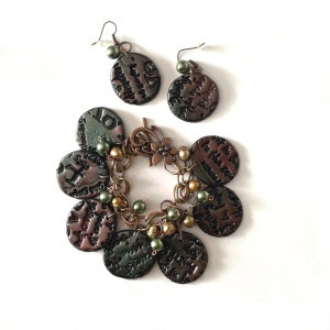 Love Letter. Handmade Bracelet and earrings. Handmade polymer clay stamp with Romantic Love Letter stamp. Circular multi color beads beads
