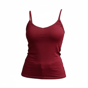 May include: A burgundy camisole top with thin shoulder straps and a V-neck. The garment is made from a soft, form-fitting fabric. This camisole is a versatile wardrobe essential.