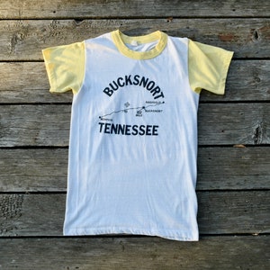 Vintage Bucksnort Tennesssee Yellow White Ringer Tee 50/50 Olympus Shirt T-Shirt Single Stitch 80s