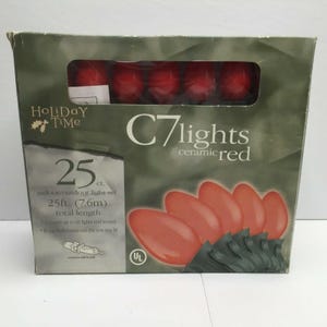 May include: A box of 25 red ceramic C7 Christmas lights. The box says "Holiday Time" and "25ct. indoor/outdoor light set 25ft. (7.6m) total length" and has a UL safety certification.
