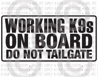 May include: Black and white sign with the text "WORKING K9s ON BOARD DO NOT TAILGATE". The sign is surrounded by a white border.
