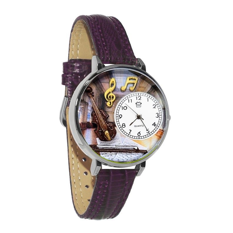May include: A silver wristwatch with a purple leather band. The watch face features a violin, musical notes, and a sheet of music. The watch has a quartz movement and a white dial with black numerals.