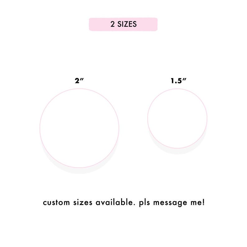 May include: White circles with pink outlines, one 2 inches in diameter and the other 1.5 inches in diameter, are displayed on a white background. The text "2 SIZES" is in a pink rectangle above the circles. The text "custom sizes available" is below.