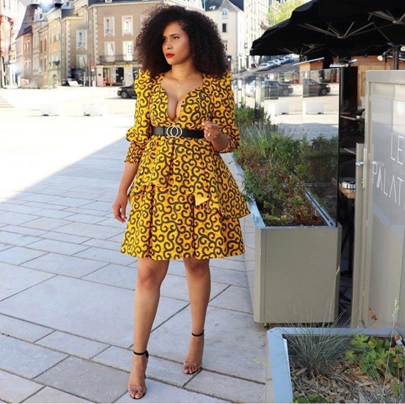 yellow low cut dress