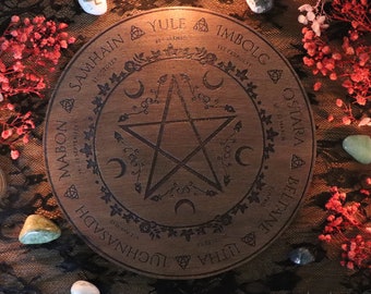 Wooden wheel of the year with pentagram, altar ornament for pagan celebration, sabbaths calendar for witches, ritual, wicca, magick