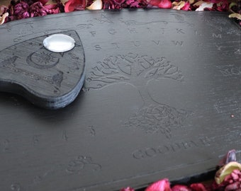 Black wooden ouija board with ravens and tree of life, Yggdrasil, spirit board, for spiritualism
