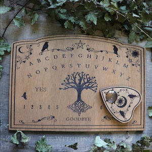 Wooden ouija board with tree of life and ravens, planchette for spiritualism, talking board