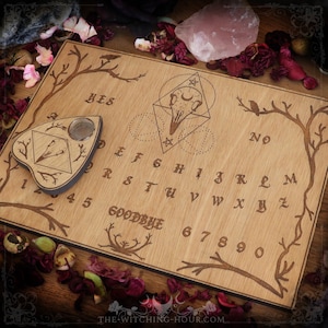 Ouija board with crow skull, made of engraved wood planchette for spiritualism occultism spirit board, esoteric tool
