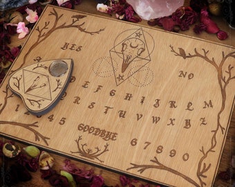 Ouija board with crow skull, made of engraved wood planchette for spiritualism occultism spirit board, esoteric tool
