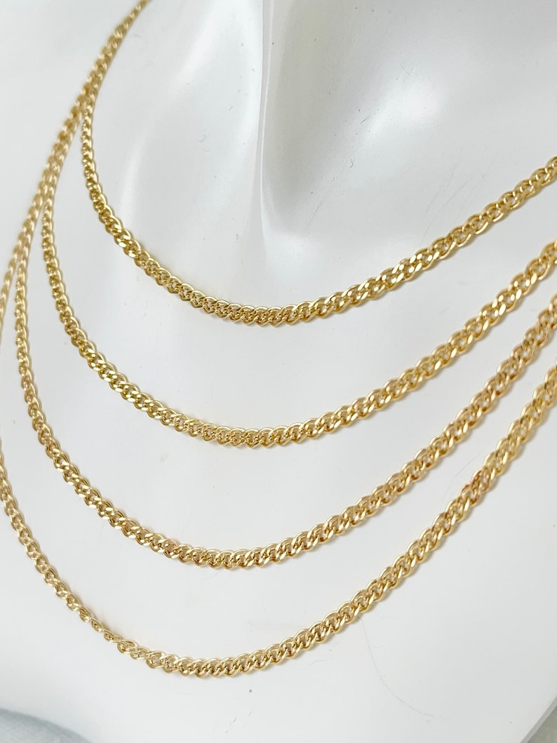 Our 2.5mm Double Cuban Nonna Chain Necklace made of high-quality 10K yellow gold.