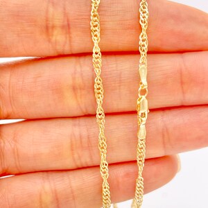 14K real yellow gold chain necklace with a twisted singapore design.