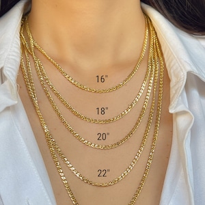 The 14K Yellow Real Gold Double Link Nonna Chain Necklace is the epitome of luxury, quality, and elegance. Rest assured, this necklace will be a unique addition to your style and a reliable accompaniment to any outfit.
