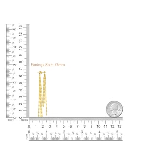 May include: A pair of 14K solid gold dangle earrings with a chain design. The earrings are 67mm long and are shown next to a ruler and a US quarter for size reference.