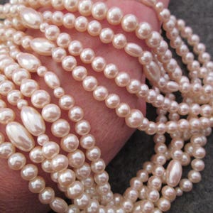 Beautiful 5 Strand Set of PEARLS Various ShapesPearls, Pearl necklace,Lustrous Pearls, Vintage 1960's, new old stock image 5